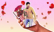 A man dancing on an iPhone surrounded by roses.