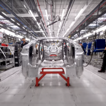 A flying view of a Tesla Gigafactory assembly line.